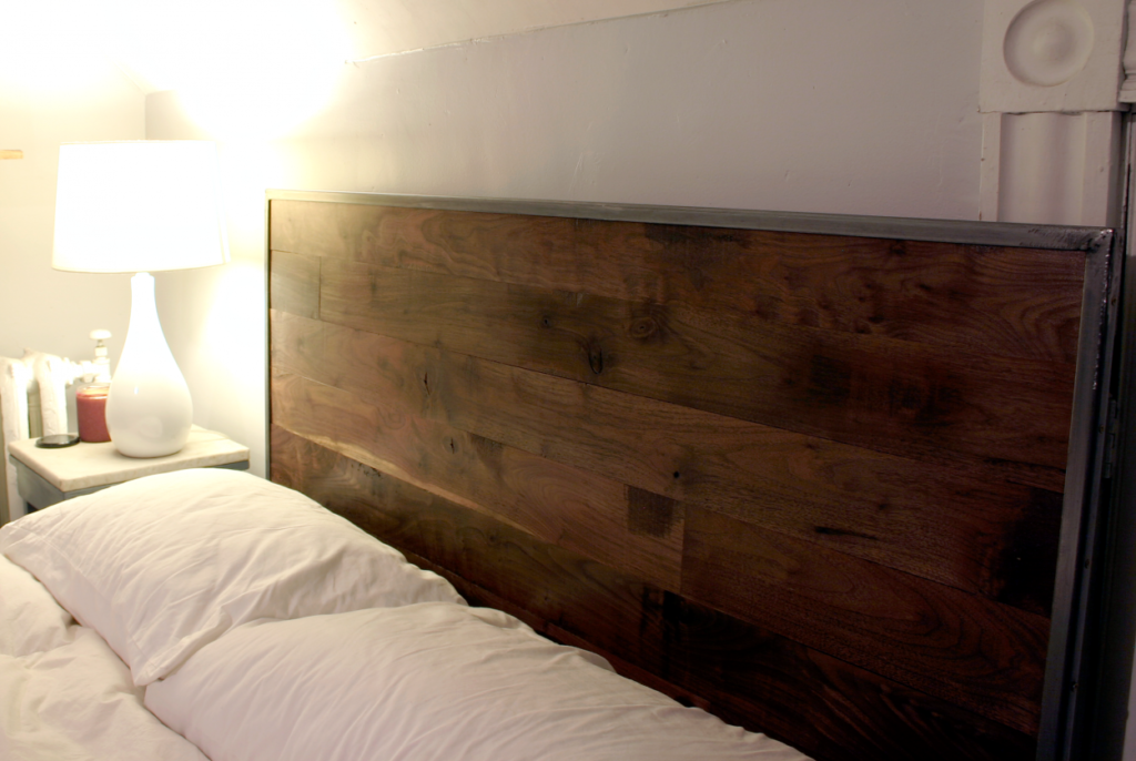 reclaimed repurposed antique salvaged walnut flooring used for a bedroom headboard by longleaf lumber