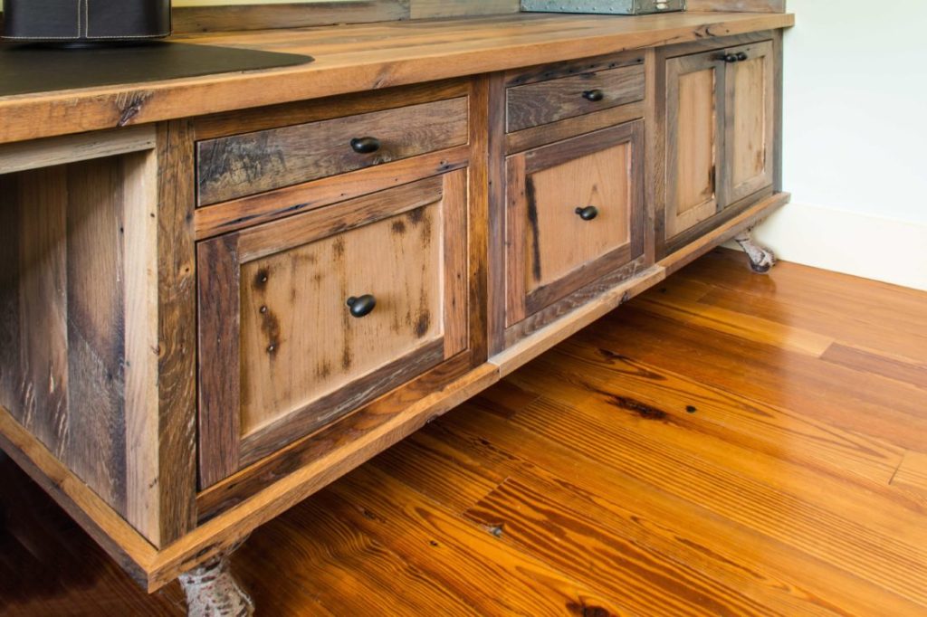 Reclaimed skip-planed oak cabinets by Hawkeye Carpentry.