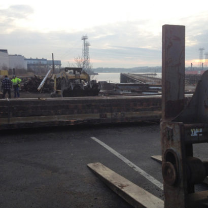 Loading Antique Heart Pine Beams at The Fore River Shipyard in Quincy, MA
