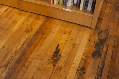 Reclaimed maple flooring at An Unlikely Story bookstore